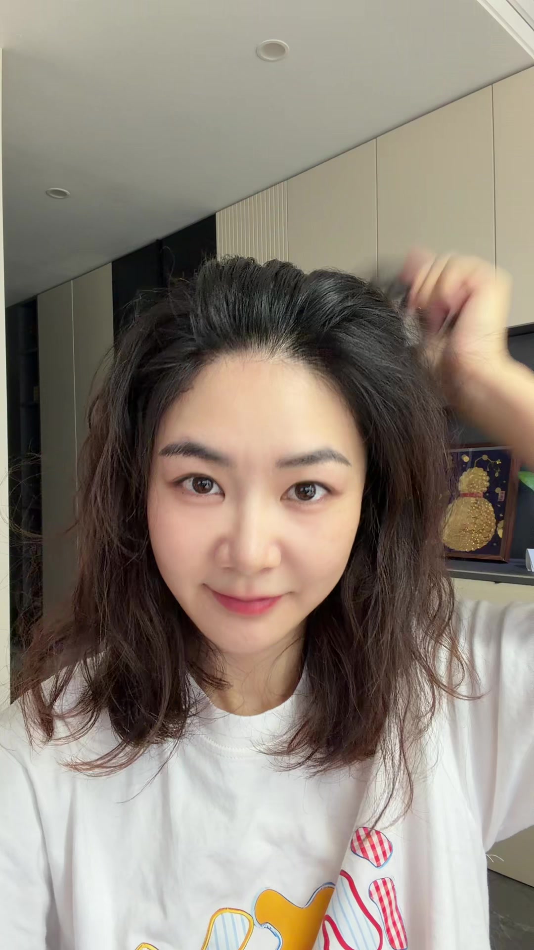 Original video still: An unhurried combing ritual